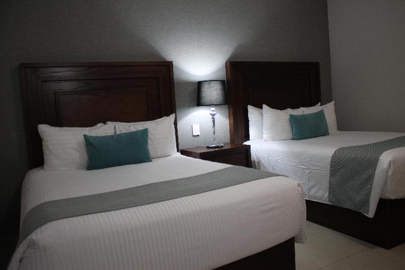 Hotel Suites Mexico Plaza Leon Campestre Ruang foto
